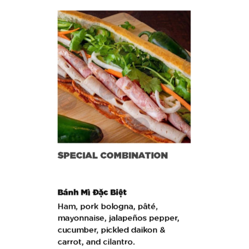 A Paris Banh Mi Special Combination sandwich, filled with ham, pork bologna, pâté, and fresh vegetables.