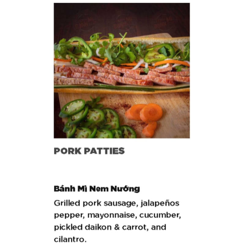 A Vietnamese Banh Mi Nem Nuong sandwich with grilled pork sausage, jalapeños, and cilantro.
